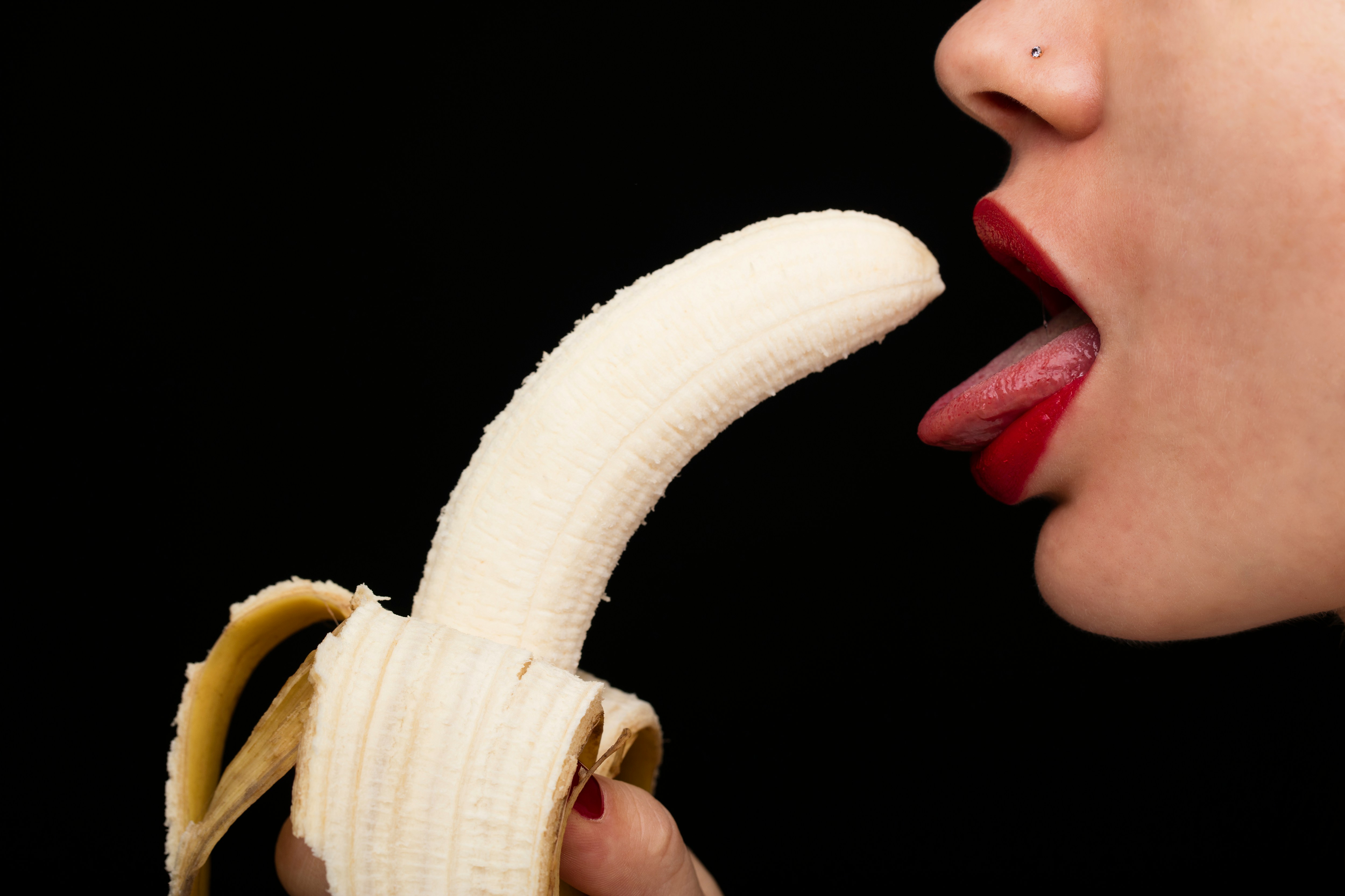 Trying to deepthroat banana tongue out.
